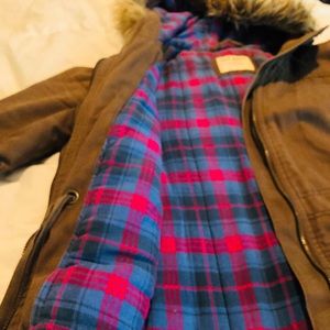 Flannel lined knee-length jacket fur hood